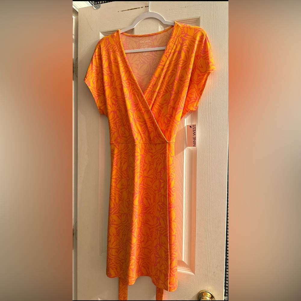 NWT brand new nine west wrap dress . gorgeous orange and pink design .